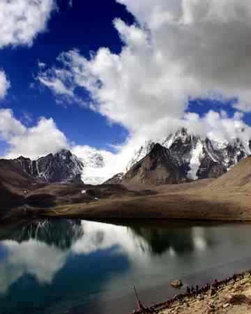 Beautiful Gurudongmar Lake view surrounded by mountains in North Sikkim.