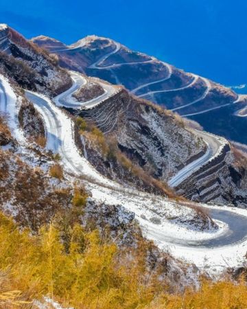 Zigzag road in winter and early spring on Sikkim tour. | east sikkim tour package